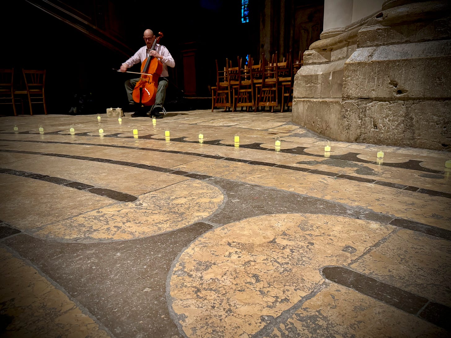 Rob Hodges playing cello in the cathedral