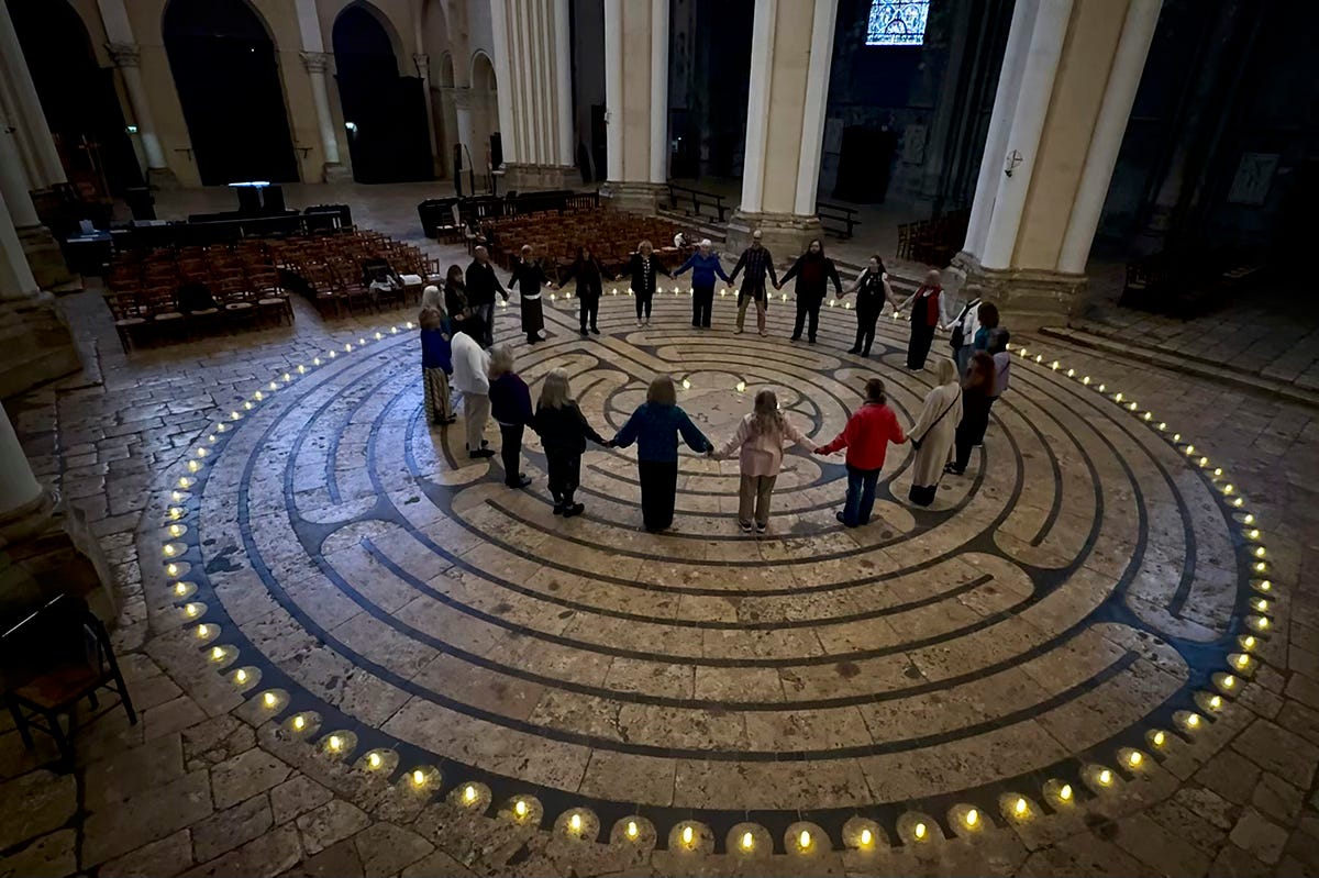 Pilgrims circling the labyrinth with Lauren Artress