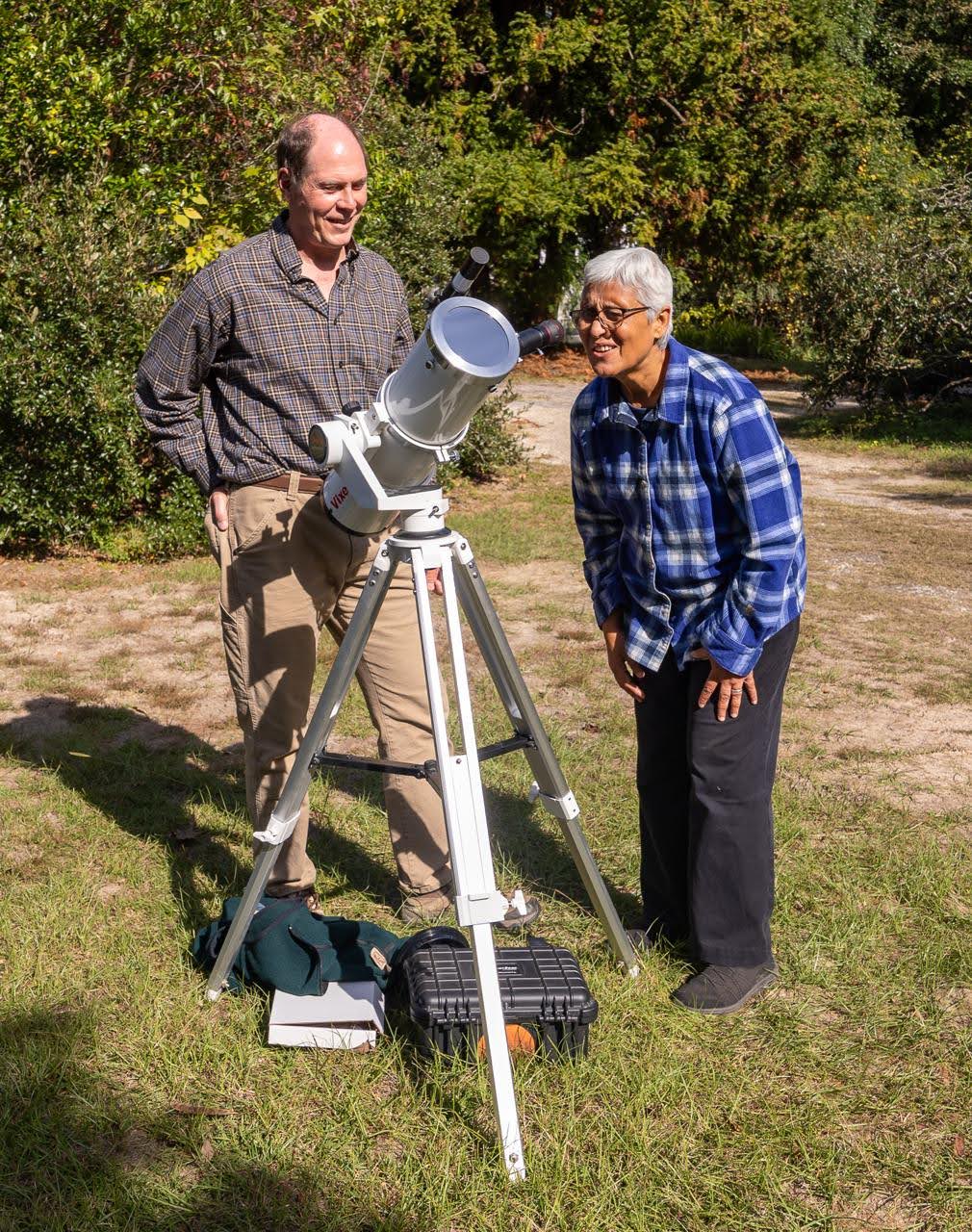 Stephan Martin stargazing with a participant